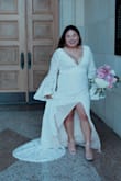 Absolutely love this dress! Wore it for my elopement & it fit perfectly. I'm 4'11, 165, 36C & ordered a XL. I did not hem the dress. It was very long but I treated the extra length as a train. The slit in the dress helped pull the train look off. - Kori B.