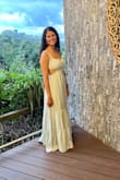 I wore this on my honeymoon in Costa Rica and it was perfect. The material at the bust area is thick so you don't have to wear a bra. I love the cutout sides and back area. The light green color is perfect for a tropical or spring/summer vibe. I love this dress! - Shannon F.