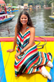 I'm obsessed with this dress! The variety of color stripes makes it go with so many different accessories/looks. I LOVE the totally open and low back for some spice. A sticky backless bra works well with this dress. - Shannon F.