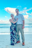 Tight in the stomach area for me, but it really made me look slimmer. I just had to be careful not to splurge too much eating. I did have to get it hemmed because I am so short.  As a wedding guest I got lots of compliments, especially on the back of the dress. I also ended up jumping into a pool and then the ocean at the end of the night haha, so if anyone wanted to know it does get heavy and clings. - Molly N.