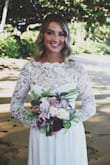 I wore this dress to elope with my sweetheart in Hawaii, it looked beautiful and I got a lot of compliments!! - Ally M.