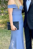 This dress fit like a glove and the material is thick enough not every bump shows. I highly recommend. - Emily P.