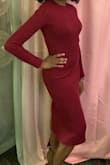I love this dress. It's thicker and more sweater-like than it looks in the photo. It hugs your curves just right. And the material is not itchy. You can dress it up or down. - Candice C.
