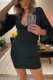 This dress is gorgeous! It fits true to size and is nice and snug in the bust so I don't worry about falling out with the low cut. The color is beautiful and the bell sleeves are so elegant. 10/10. - Rebecca L.