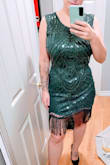 I am 155-160 pounds, hourglass shape, and have a 32 G bust size. I probably could have gotten away with a Medium, but my guess is that it would ride up, and if this dress is too tight then the zipper will push out in the back. Also, it is a little difficult to get out of so if you have someone to help you out that would be a bonus. If you wear it out to a party and have too many drinks you might be sleeping in this dress. It is good quality and has a little stretch to it as well. - Nicole J.