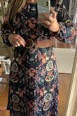 Was nervous to purchases online after gaining the dreaded quarantwenty. I followed the size recommendation guide and the large fit perfectly. Love the material and pattern/colors. This can be dressed up for a semi-formal event, or cute enough to wear to work! Love it! So happy with this purchase. - Amy N.