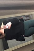 Exactly as advertised however there is a large thickly sewn band around the shoulder that isn't adjustable to keep it around your shoulders. Once I got used to that, it was just fine! Order your regular size. - Nalani J.