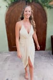 I felt so beautiful in this dress! It's a low neck line so I definitely recommend sticky boobs. The material was thin enough that I didn't sweat during an outdoor dinner in Mexico. Definitely recommend! - Kelly C.