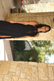 This dress fit perfectly and was so comfortable to wear while dancing all night! Just beware, if you're shorter, you'll probably need to get it hemmed. I wore 4 inch heels with it, and there was still fabric touching the floor. - Caitlyn H.