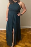 This dress was amazing, it fit so well. The only problem I had was that it was meant for someone 6-7 inches taller than me! I took it in the get altered and then it was perfect! - Megan C.