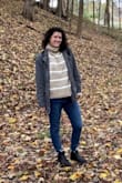 I love this sweater! It's warm without being hot since it is light weight. It's also stretchy so I hand washed it to avoid stretching it out. I think machine washing on delicate will be fine. - Kaitlin M.