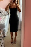 This dress fits like a glove. Super comfortable and stretchy but also has that fitted flattering look! I got so many compliments on it all night. The material is soft, I wore it for 12 hours straight with no complaints. 10/10 recommend this dress! - Kassidy P.