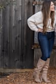 They fit perfect and are very versatile. I wore them with skinny jeans but they can be worn with a dress as well. I have regular size calves and they weren't too tight or loose, they were perfect. I haven't been able to find a boot like this anywhere else! - Grace B.