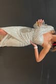 Wore this to my cousin's wedding. It was stunning. Stayed up and in place as I danced at the reception as well. Zero complaints plus I could wear a strapless bra with it no problem. - Katherine W.