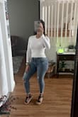 These are high waisted jeans without being too high. They have a little stretch to them. I wear them often! I'm usually a size 5 but the 3 hugs my curves better. - Maggy S.
