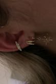 Bought this and I love it! I haven't showered with them, but I have worn them consistently and they look so great in my stack on my ear. I wear it in the second piercing and I love them!! Def would recommend it. - Jolie K.
