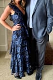 This dress is a stunner. So unique and well made. Runs a little large, but the bit of extra room made it comfortable to sit and dance. Loads of compliments - you wont see anyone where you're going with anything like it! No bra needed, this dress is honestly perfect. - Julie K.