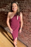 Highly recommend this dress! It is both comfortable and flattering. I read reviews about not being able to find a bra to wear with this and I agree. The slit in the front is off-center so almost any bra would show to some extent but this material is thick enough that a bra is not necessary. Based on my measurements, I followed the sizing guide and other reviews and it fits great. - Gina M.