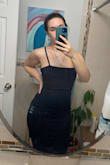 Runs a little tight, but will hug alll the curves you didn't know you had! Very nice material and the slit on the side slims your legs. - Shirel S.