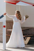 First, Lulu's is AMAZING for wedding dresses. Less than a week before our wedding celebration, all our wedding attire was stolen out of our rental vehicle and I was in a pinch to find a back up wedding dress. I ordered 6 different dresses from Lulu's and selected 2 day shipping. Everything arrived on time and perfectly packaged.
The feel and fit of this dress on me, was perfection. The material was SO SOFT. The dress was so comfortable. For my height and with heels it was still really long but I did not care at all as I was beyond thrilled to have found a dress that fit like a glove without any alterations needed. I felt SO beautiful and comfortable in this dress.
THANK YOU to everyone who provided reviews for this dress before me. I appreciate you all SO much. - Ciara G.