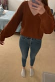 I liked how it looked. It was cute both ways you can wear it, but the material was itchy and uncomfortable. I wouldn't be comfortable wearing it so I returned it. Also the sleeves puff out even more than it looks like in the pictures. Not really a fan of the sleeves, but I still think it's a cute sweater if you don't mind the feel of the material. - Jenna K.