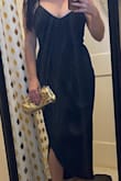 Needed a dress within a week and found this gem. It really fit true to size and I loved the length of it. You do have to adjust the straps a bit so that they don't fall down but I wore a cape jacket over it so I was covered a lot of the time in the chest area. Highly recommend this dress. Simple but super pretty I'm wearing a medium. - Lindsay M.