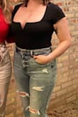 I love this bodysuit. The material is thick and supportive enough that I didn't feel the need to wear a bra and wasn't worried about showing anything if I got cold. I generally don't feel comfortable wearing slim-fitting clothing or showing off the girls, but I feel super sexy and confident in this bodysuit. It's so slimming and flattering.
If you do want to wear a bra, I would size up because it's pretty tight. - Katie D.