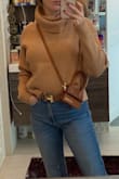 This material is sooo soft and it's cropped at the perfect height to also tuck into high-waisted jeans or leggings! - Alison P.