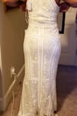 This dress is beautifully embroidered and beaded for a price you can't beat! It is long but fits nicely on curves!! - Della K.