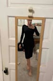 The material is thick and warm, thicker than I thought, the cut in the back is sexy and the dress is professional in the front party in he back! - Maggie M.