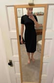 This dress is a great material and fits true to size, I love the cut In the back but I think I will return it because I found a dress I like more. However, the cut in the back is flattering. The zipper on the top part behind the neck is impossible to do yourself so make sure you have a friend to zip you up. It's sexy but not as sexy as in the model. - Maggie M.