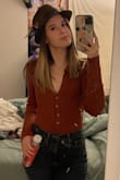 I loved this bodysuit! It's not too thick or thin, but warm enough on a chilly night. I normally steer clear of any V-necks or lower necklines since I do have a small chest but this was perfect, nothing was loose or looked weird. I can't wait to wear it to Thanksgiving festivities - ALAYNA T.