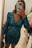 The perfect dress looks exactly like the picture. Loved how the material was stretchy. I would buy your normal size, don't size up or down! - Taylor H.
