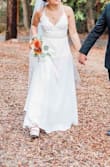 I felt like a princess on my wedding day! The dress was SO beautiful, especially after adding my belt and veil.
I did have to get it hemmed because it's super long. The top was a little big for me since I'm small up there, but it had adjustable straps so it worked out. - Rachel C.