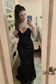 This dress is so beautiful! It is very long though and I will probably need to get it hemmed. It is so flattering and beautiful! - Ava S.