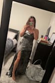 I originally ordered a large after I saw someone said the dress runs small, but was able to exchange it for a medium so definitely size down. I absolutely love the dress and it'll be perfect for the formal event I'm going to! - Kelsey G.