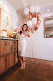 This dress is sooo perfect for the bridal shower or casual court wedding. It's casual but still has a lot of beautiful touches to make you stand out. I normally wear US size 4-6 & this dress in Medium fits me perfectly. If you have a bit of belly, it will show though. - Thao N.
