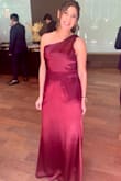 The material feels super soft and the burgundy color looks amazing. The dress was too wrinkled so I had to send it for professional ironing upon arrival. I looked classy and elegant. - Mirna M.