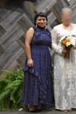 Such a gorgeous dress; I wore it to a wedding! It flows really nicely when you walk and the frills are just adorable. I got so many compliments! I'm 4'11 and about 138 lbs and a medium fit perfectly. It wasn't too long either, the length was just right! - Mikaela P.