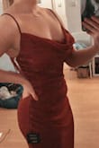 This dress did not fit well. I used the size questionnaire to find my size and was recommended a medium. Size down if interested in getting this dress, very stretchy. It's not as fitted as I wanted, but still it seems like there's so much excessive fabrics and the neckline is nothing like the picture. It has some serious cowl neck. I was expecting slight draping as the model with small chest had almost no drape. I have a bigger chest so I did not expect this amount. It looks and feels poorly made, as the overlay is just thrown over. There's also this weird gap between the overlay and the underdress over the bust that your breasts could fall out and you wouldn't notice until someone point it out to you, hard to explain. - Thea I.
