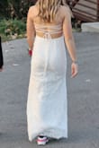 We ordered this dress for my daughter's school dance after we couldn't find anything locally. We needed it in a hurry so we paid for expedited shipping and we were pleasantly surprised at how well it fit and how well made it was, especially for the price- even with the extra shipping cost. The material is thick but not stiff or scratchy. We had a little difficulty getting it really tight on the top, but we were able to get it tight enough for her to feel comfortable. Also, she can't wear heels so we were worried it might be too long but it worked pretty well with her flat shoes. All in all, this was a great dress and we will definitely order from Lulus again. - Angie O.