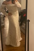 My dress is absolutely stunning and makes me look amazing! I have a wider back so I need a few adjustments but overall I can't wait to wear it on my wedding day! - Jessica H.
