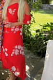 Unique look with the shoulder cutaways and light material. - Nicole M.