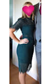 This dress fits perfectly! My friend had a small wedding and this was the perfect dress for it. - Carlye B.
