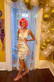 I got this dress for my bachelorette party. It fit a little strange at the top and a little loose at the bottom, but it wasn't noticeable and I didn't find myself fixing it much. I also bought it because it was on sale and I knew it might not fit that well! Would still recommend it. - Destinee S.