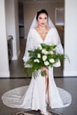 I wasn't expecting to love this dress the way I do! I've been rather self conscious with trying on dresses for my November wedding. My problem isn't my tummy but my shoulders being wide! It fits perfectly with minimal altering needed just for the height and adjusting the slit. It's modest but womanly. I added a belt from Lulus as well as I got my shoes here. - Emilee M.