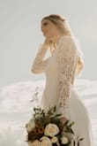 It's such a simple dress but the simplicity makes it so beautiful. I received it in just a few days as well! It made my booty pop haha! And the back of it was so gorgeous. The dresses on here also come with a dress bag to hang them in! - Caity D.