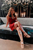I got this dress for a party and it was a huge hit! Everyone loved it. The straps are a little big and you can't adjust them so I pulled them together to make more of a halter top. It fit great & looked exactly like the pictures! - Samantha K.