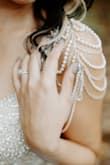 When I first saw this dress I immediately fell in love. I remember, I wasn't even engaged yet and I knew this would be my dress. It's an absolute dream come true!
I did add some shoulder jewelry that I found online, that fit perfectly. Thank you Lulus for this amazing dress!
xoxo,
Andrijana - Andrijana G.