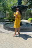 This dress fit like a glove! I am a bit chesty, so the dress stayed in place very well. I also have big thighs and butt, but the dress fit very nicely and with space. The yellow was amazing. I wore this dress to my undergraduate graduation and it was gorgeous. Definitely recommend!! - Jazmin N.
